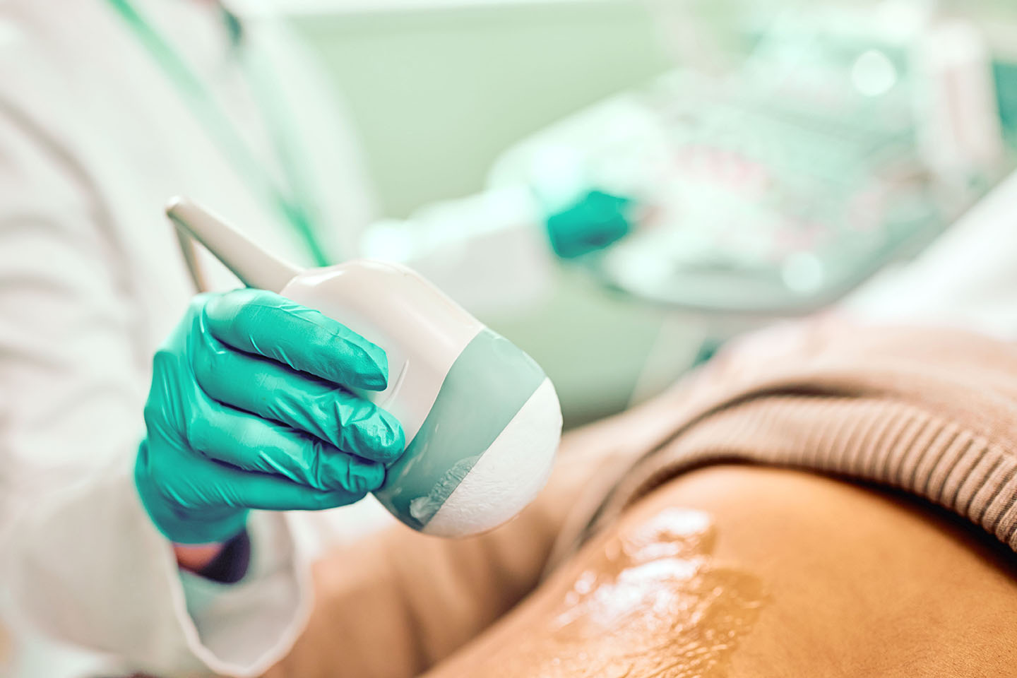 Close,Up,Of,African,American,Man,Having,Ultrasound,Examination,At Close up of African American man having ultrasound examination at doctor's office.